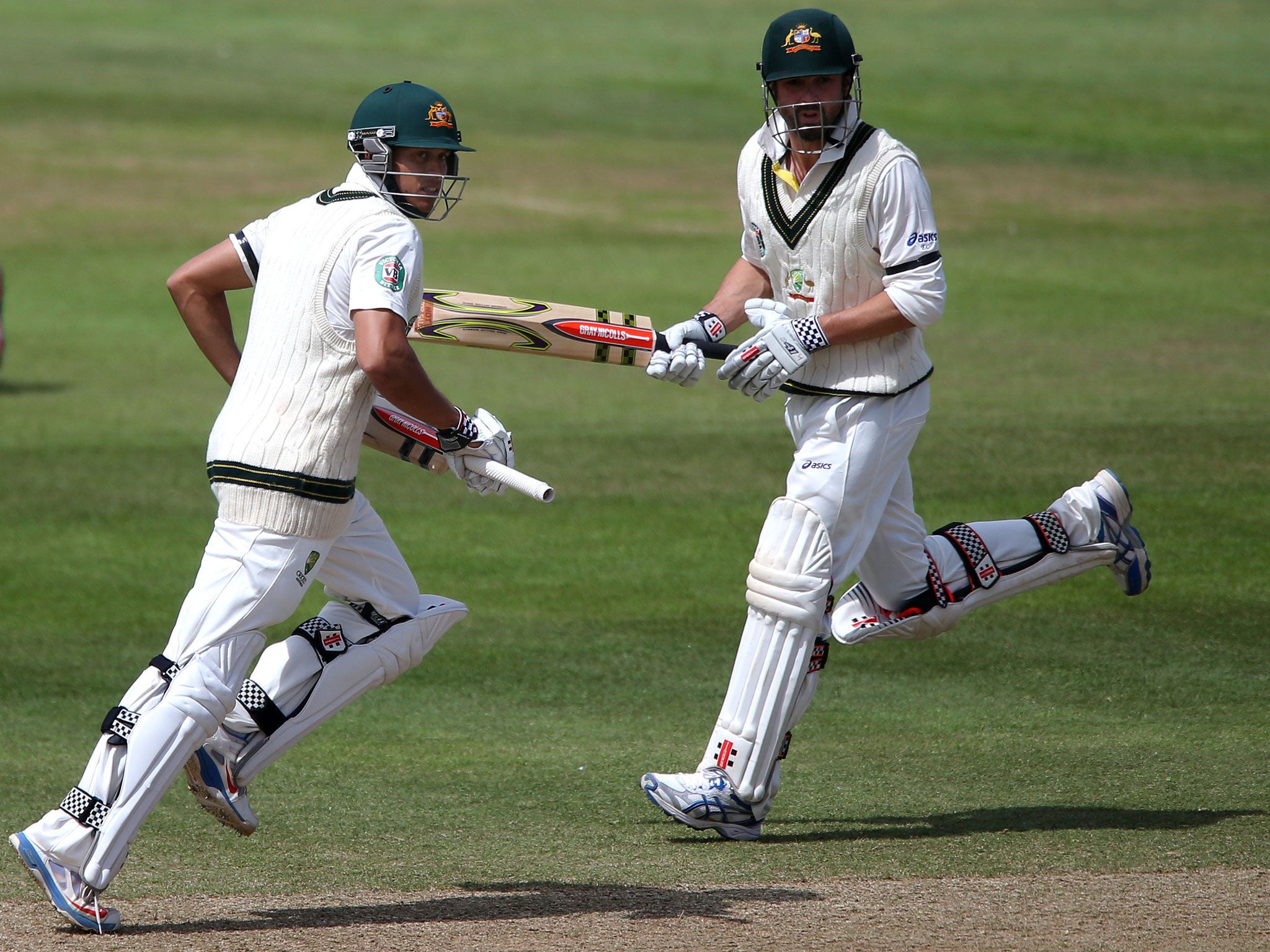 Smooth operators: Usman Khawaja (left) staked his claim to open with Ed Cowan (right) in the First Test by scoring 73 as they set Australia on their way to victory over Somerset with a stand of 86. But he is unlikely to have done enough to displace Shane