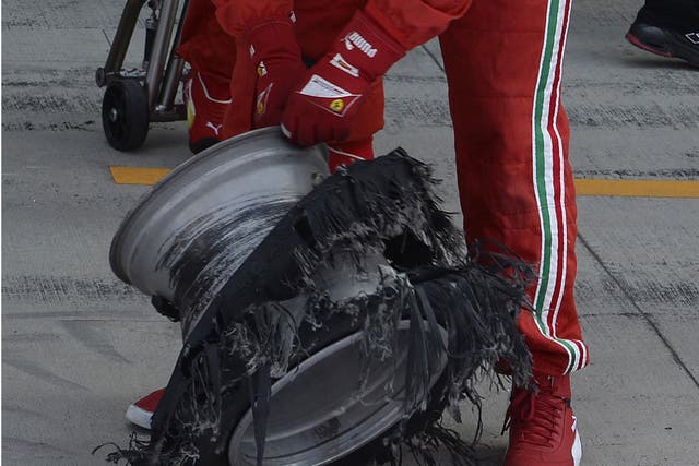 The punctured tyre of Ferrari Formula One driver Felipe Massa of Brazil 