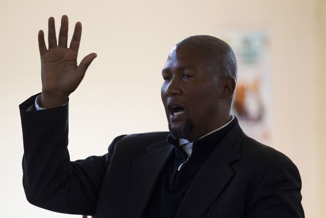 Mandla Mandela, pictured, had five of Nelson Mandela's dead relatives relocated to his own village in Mvezo. Other Mandela family members want them returned to Qunu