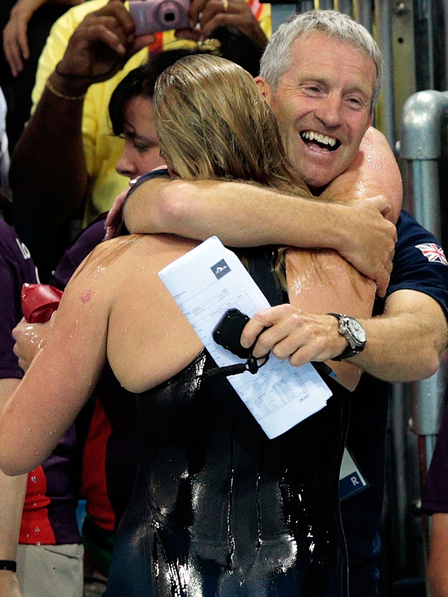 Coach Bill Furniss shares Rebecca Adlington’s joy after she won a bronze medal in the 400m freestyle at the London Olympics