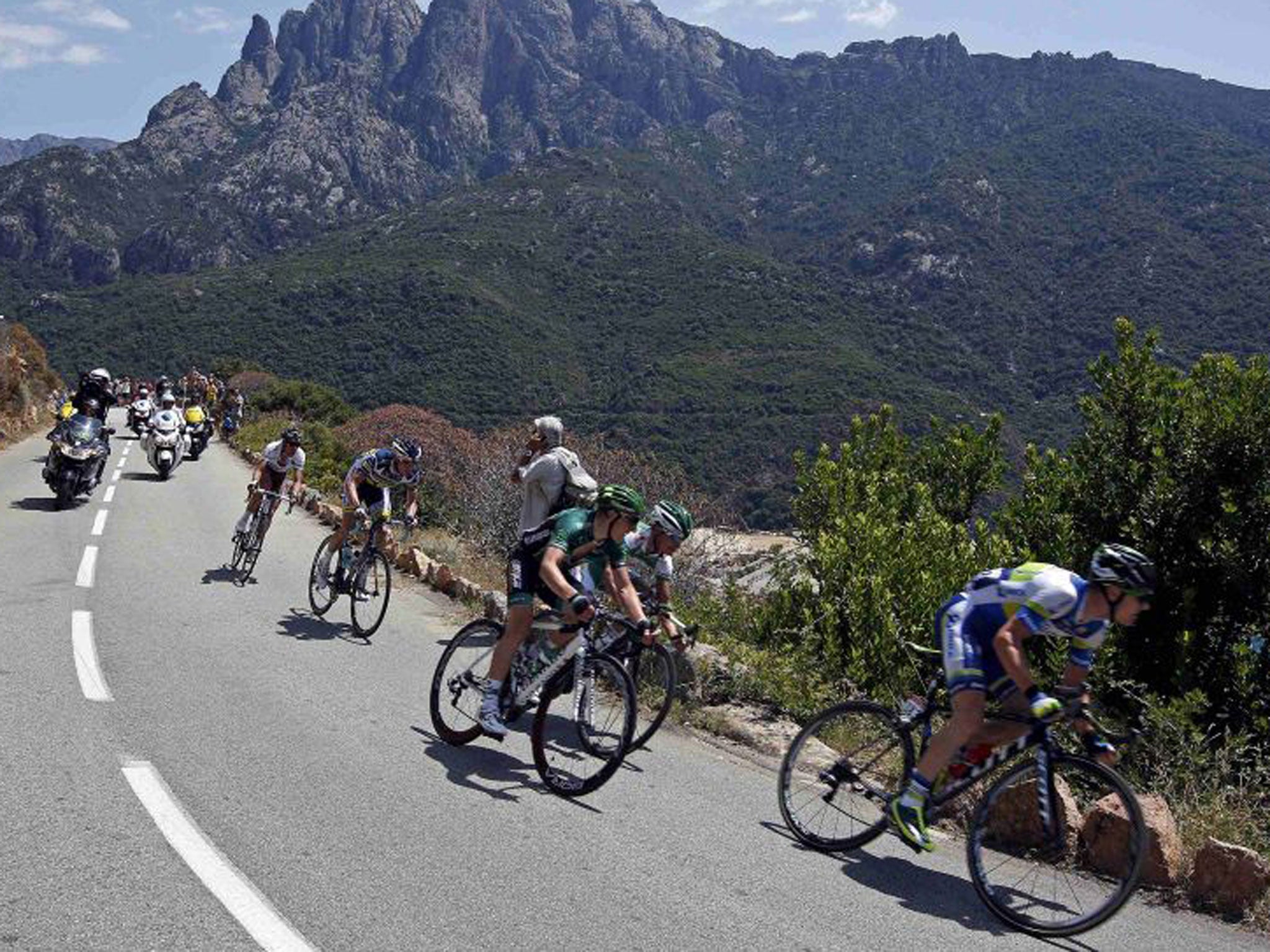 The peloton makes its way through Corsica’s rolling hills