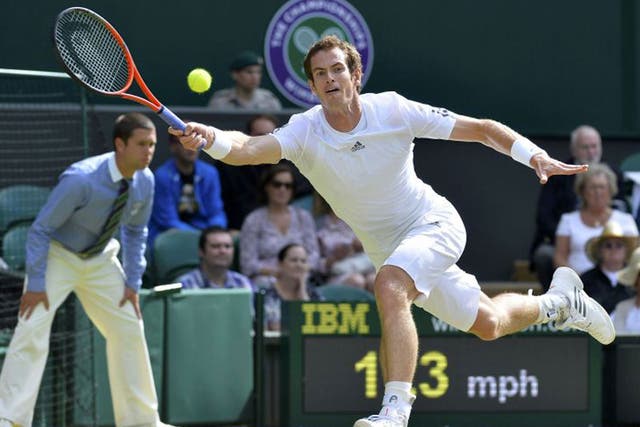 Andy Murray stretches to make a return during his win over Russia’s Mikhail Youzhny yesterday