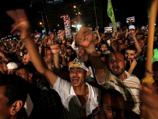 Supporters of Egyptian President Mohammed Morsi take part in a rally near the Rabaa Adawiya mosque in Cairo