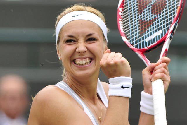 Sabine Lisicki celebrates her victory over Kaia Kanepi to progress to the Wimbledon semi-finals