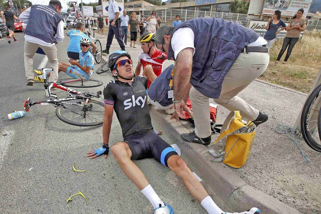 Tough spokes: Geraint Thomas after his fall on Saturday