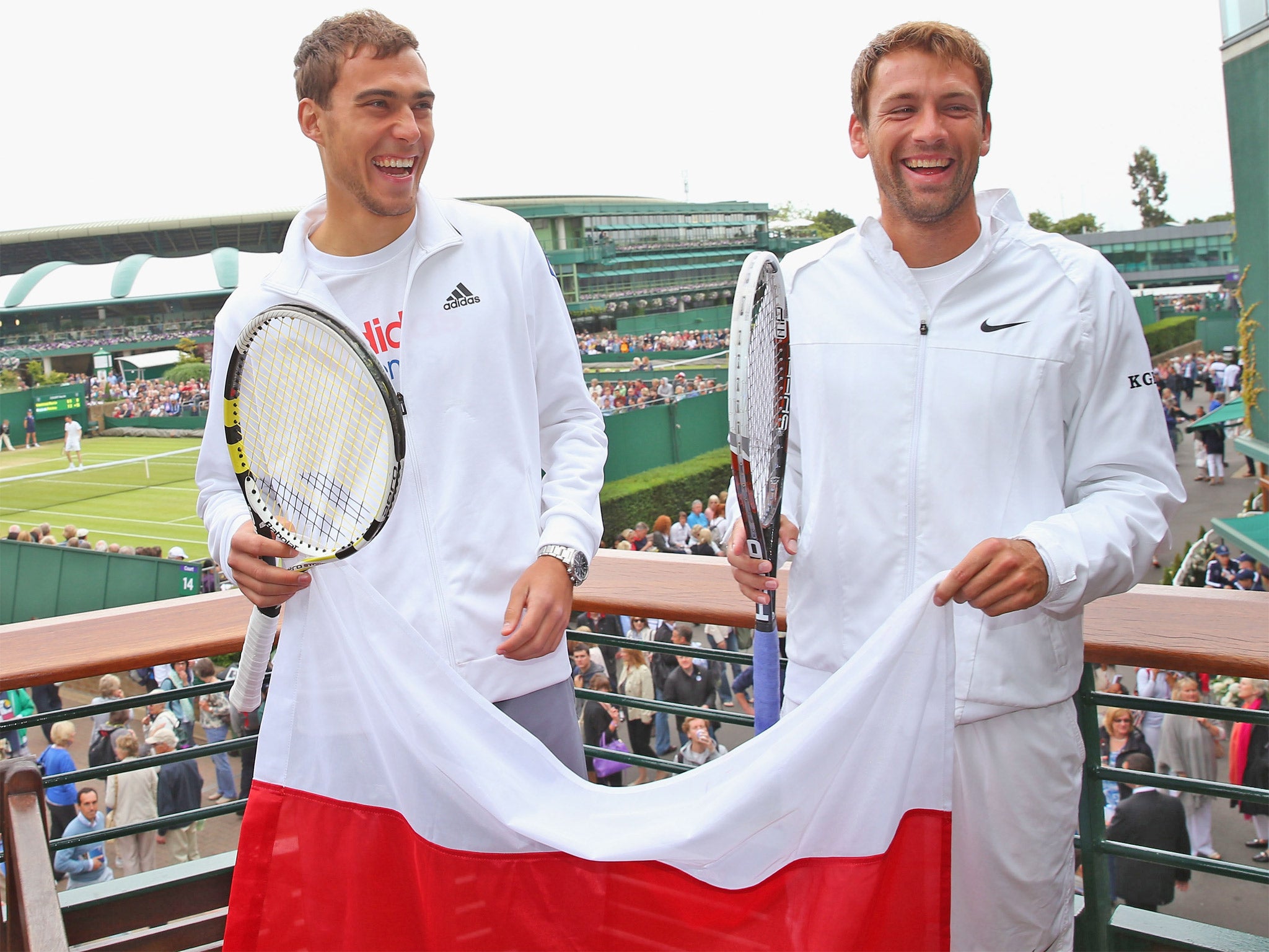 Jerzy Janowicz and Lukasz Kubot are all smiles ahead of their quarter-final encounter