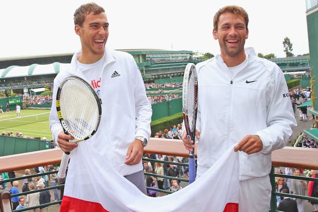 Jerzy Janowicz and Lukasz Kubot are all smiles ahead of their quarter-final encounter