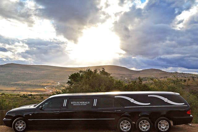 A hearse is pictured at Mvezo resort after being accompanied by a police convoy to collect the remains of former South African President Nelson Mandela's children