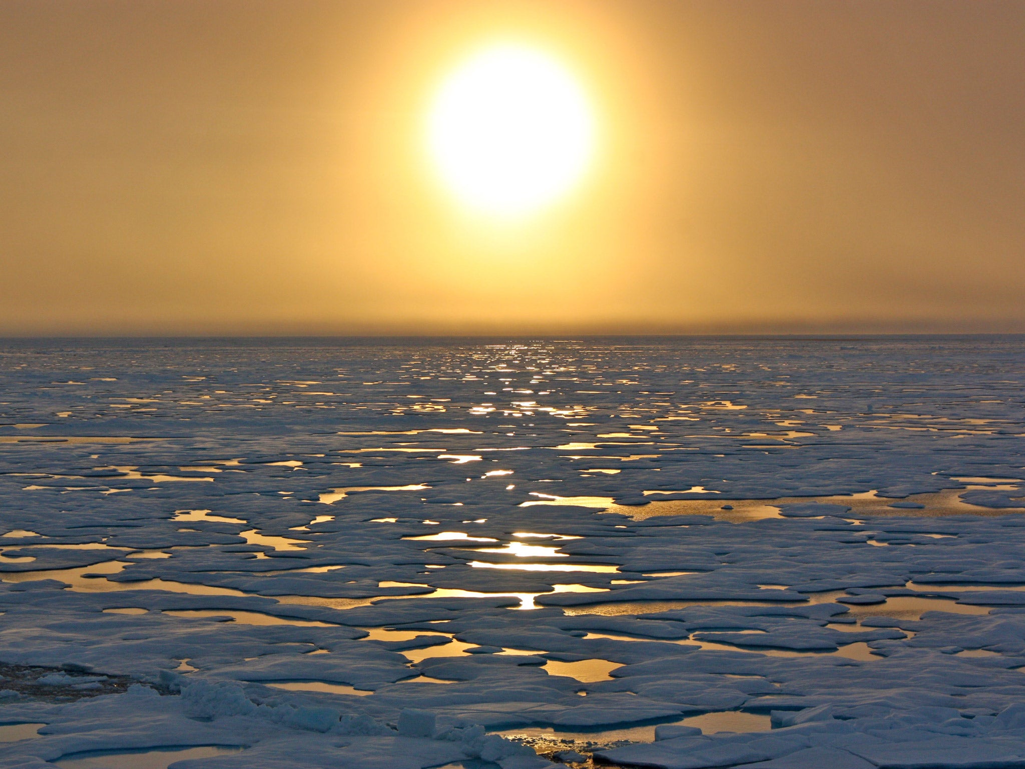 The sun sets over the Chukchi Sea. Both the northern and southern hemispheres experienced the warmest temperatures for both land and sea