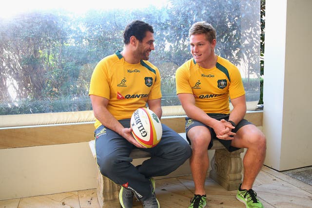 George Smith of the Wallabies talks to team mate Michael Hooper 