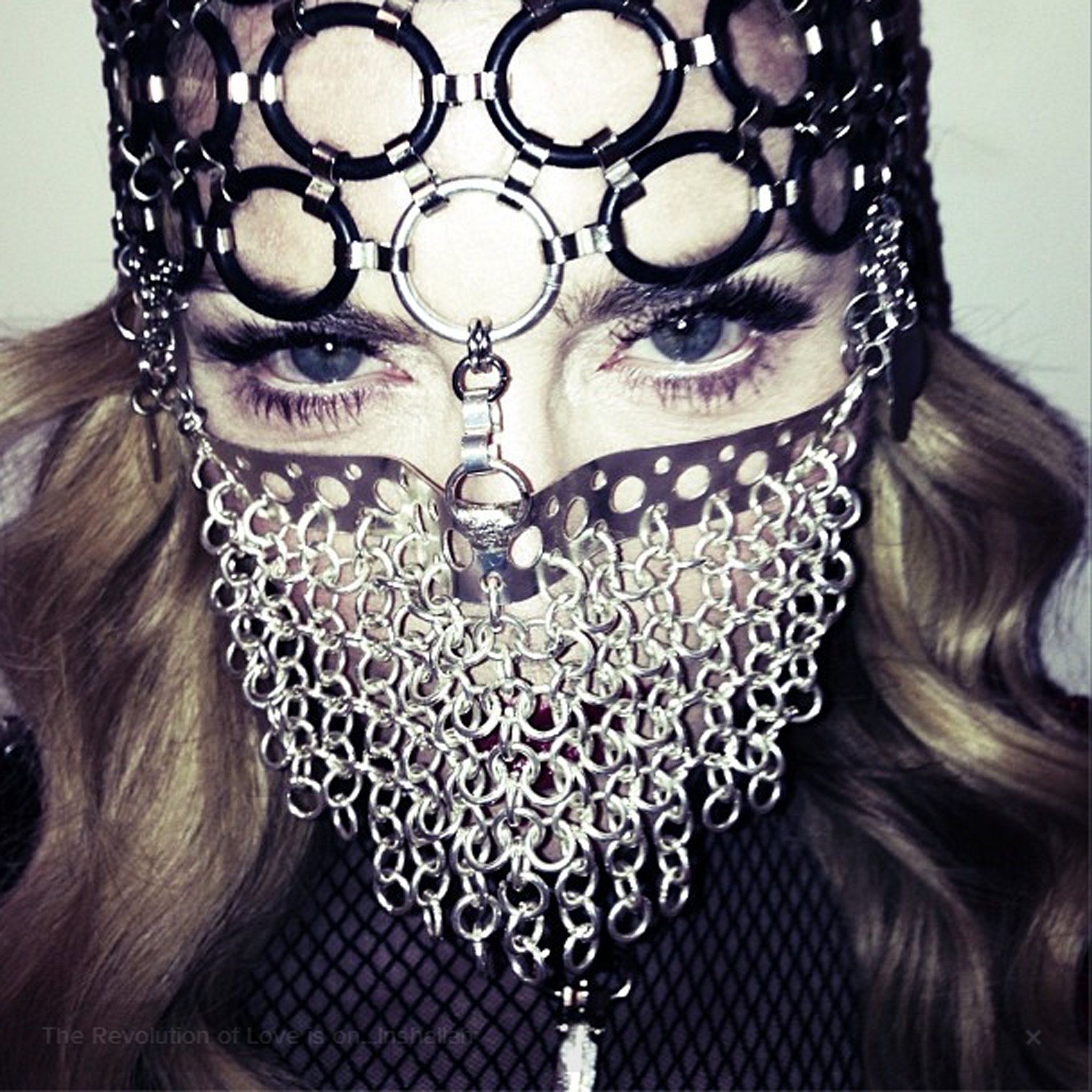 Madonna poses in a chainmail niqab for a photoshoot with US Harper's Bazaar