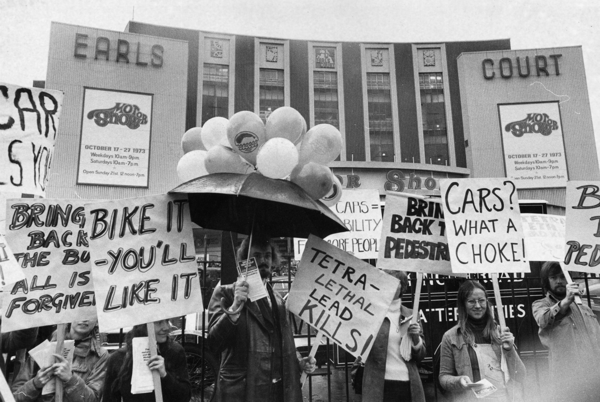 16th October 1973: Supporters of the environmental group Friends of The Earth staging a protest outside the Exhibition Hall at Earls Court, London, on the press preview day of the motor show (Getty)