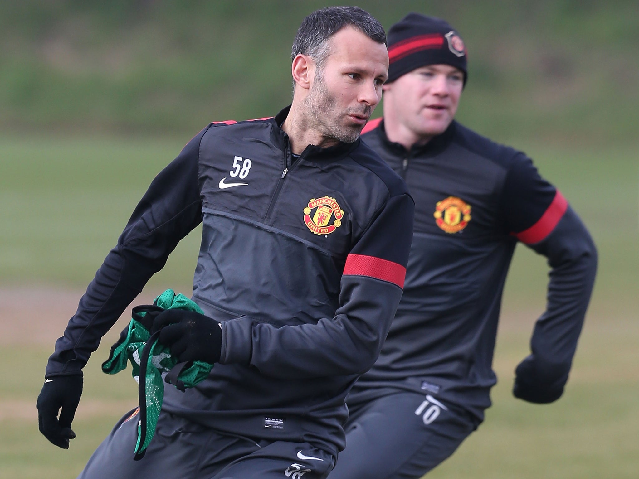 Manchester United hope Ryan Giggs' appointment as player-coach will persuade Wayne Rooney to stay at club