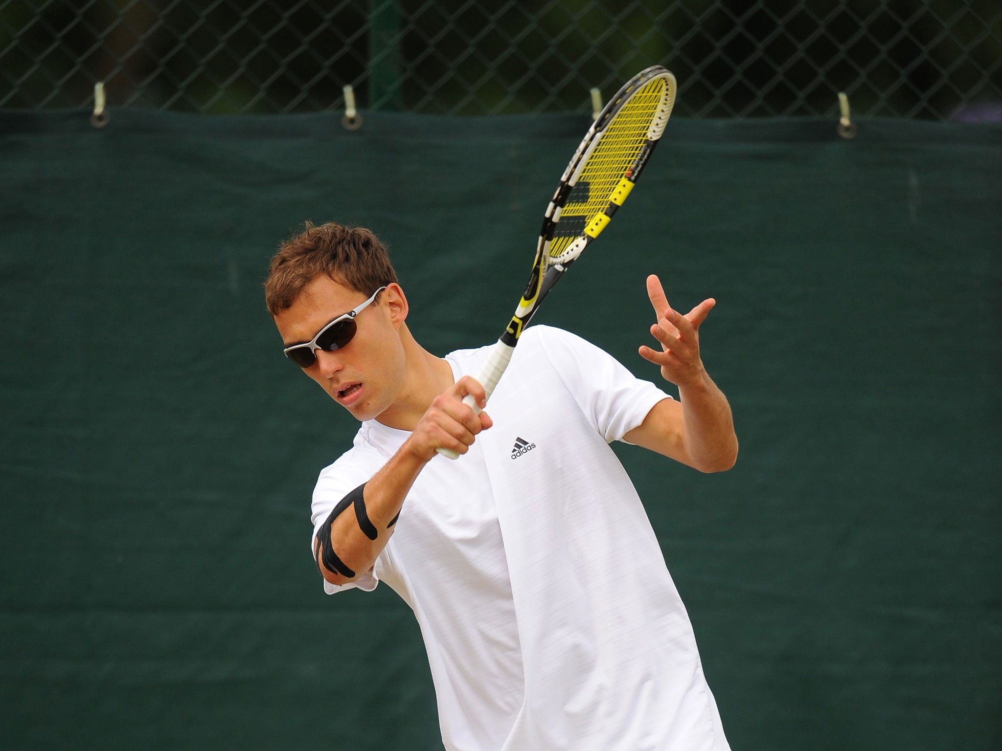 Jerzy Janowicz practises at Wimbledon