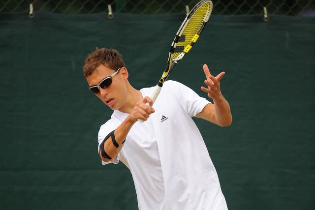 Jerzy Janowicz practises at Wimbledon 