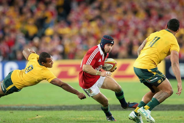 Step aside: Leigh Halfpenny beats Will Genia and Joe Tomane to set up a try