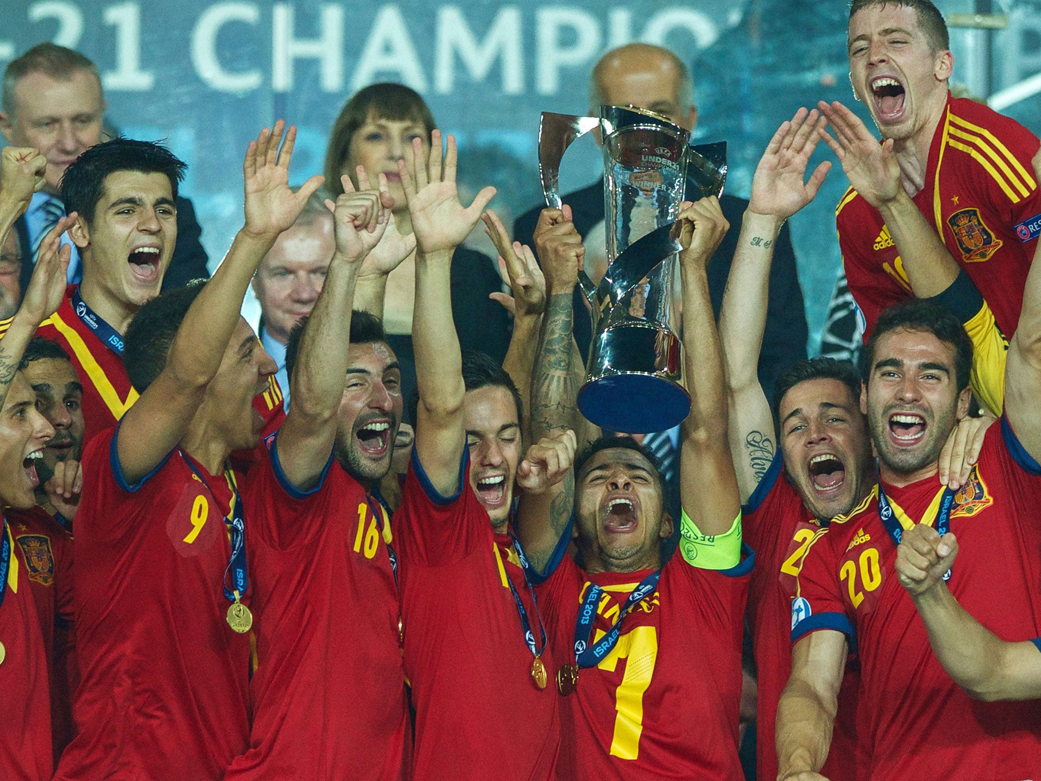 Reign in Spain: The Under-21s celebrate winning the European Championship, in which England flopped badly