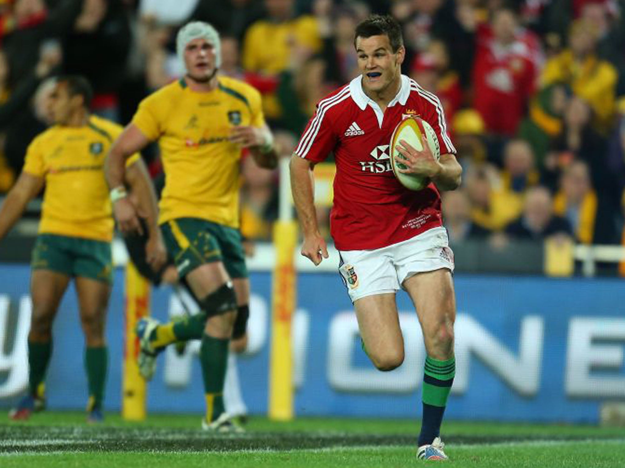 Jonathan Sexton of the Lions can't hide his delight as he runs in to score a try