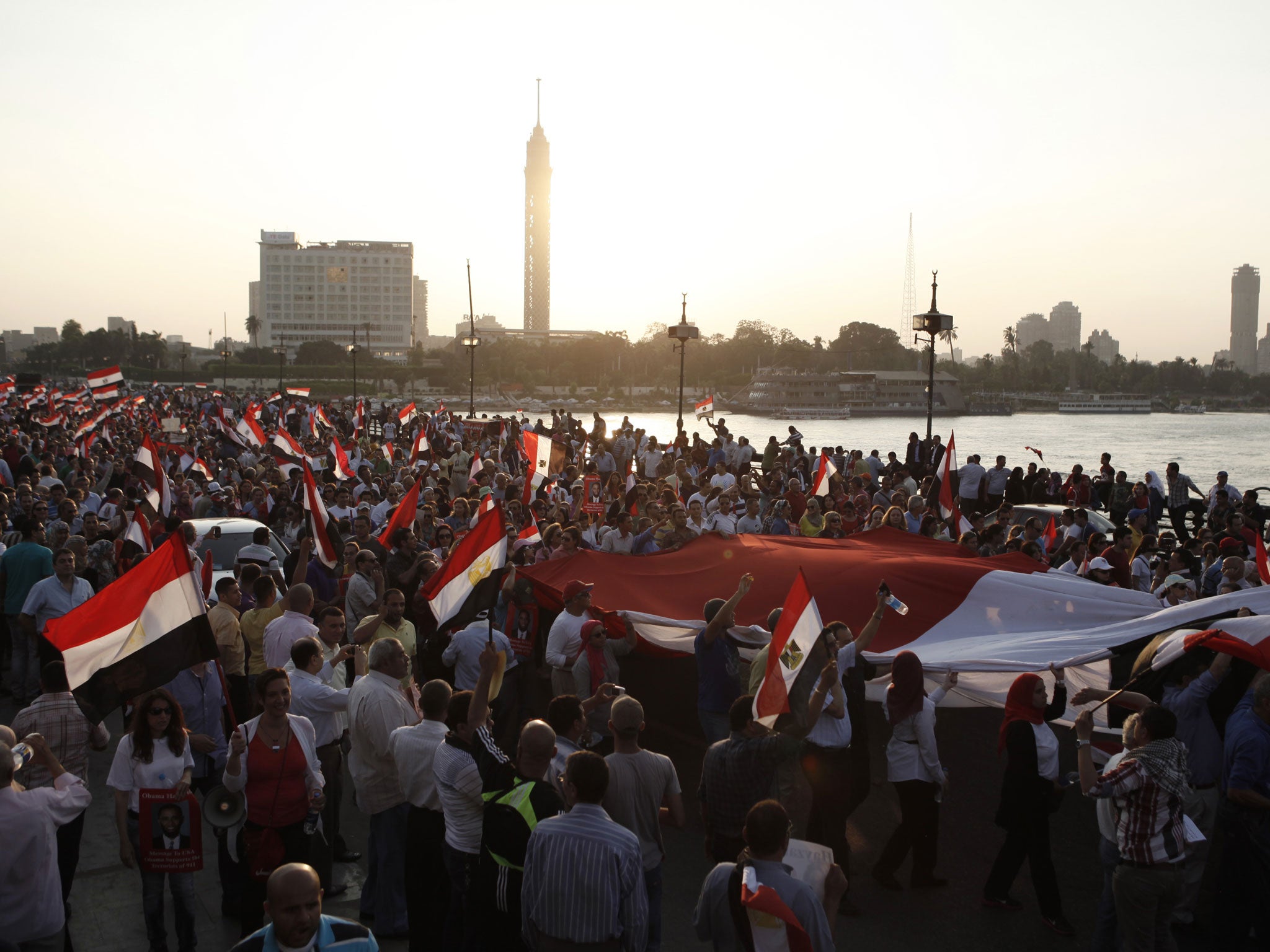 Tens of thousands of both pro- and anti-Morsi protesters took to the streets