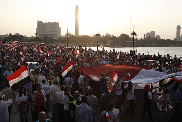 Tens of thousands of both pro- and anti-Morsi protesters took to the streets