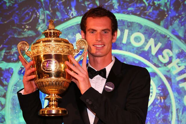 Andy Murray of Great Britain poses with his Trophy during the Wimbledon Championships 2013 Winners Ball (Julian Finney/Getty Images)