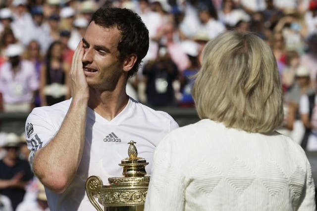 Andy Murray reflects during his post-match interview with the BBC's Sue Barker (Anja Niedringhaus/EPA)