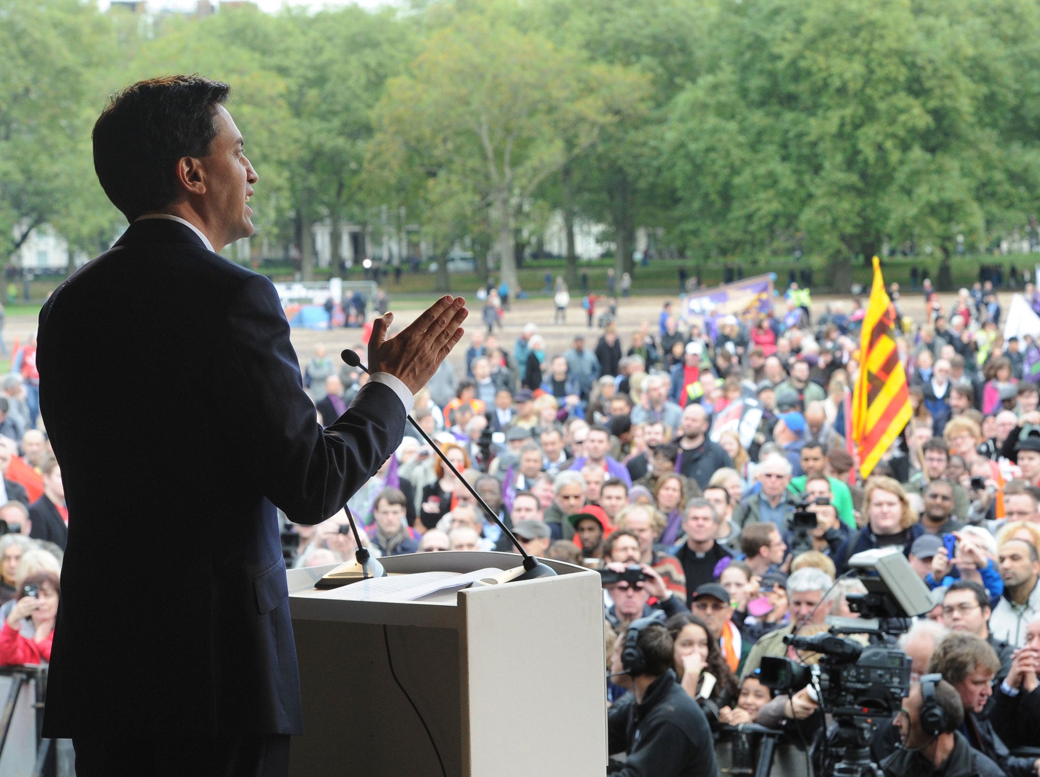 Leader of the Labour Party Ed Miliband addresses TUC members in Hyde Park at the end of a march in protest against the government's austerity measures on October 20, 2012 in London, England.