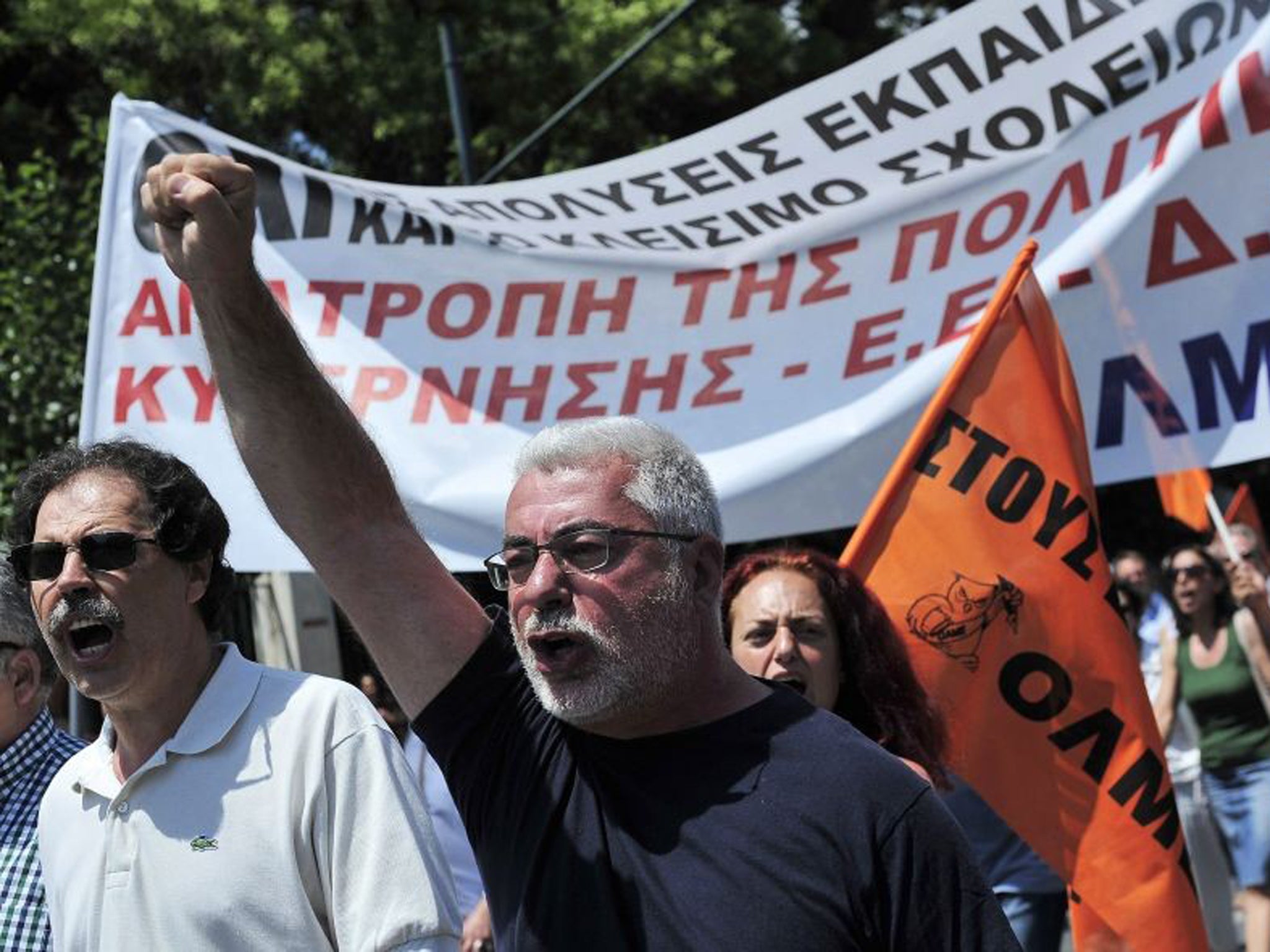 Greek state school teachers protest outside of the Ministry of Administrative Reform in Athens