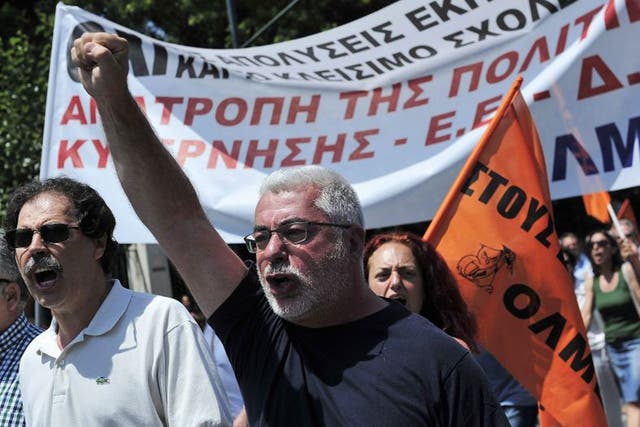 Greek state school teachers protest outside of the Ministry of Administrative Reform in Athens