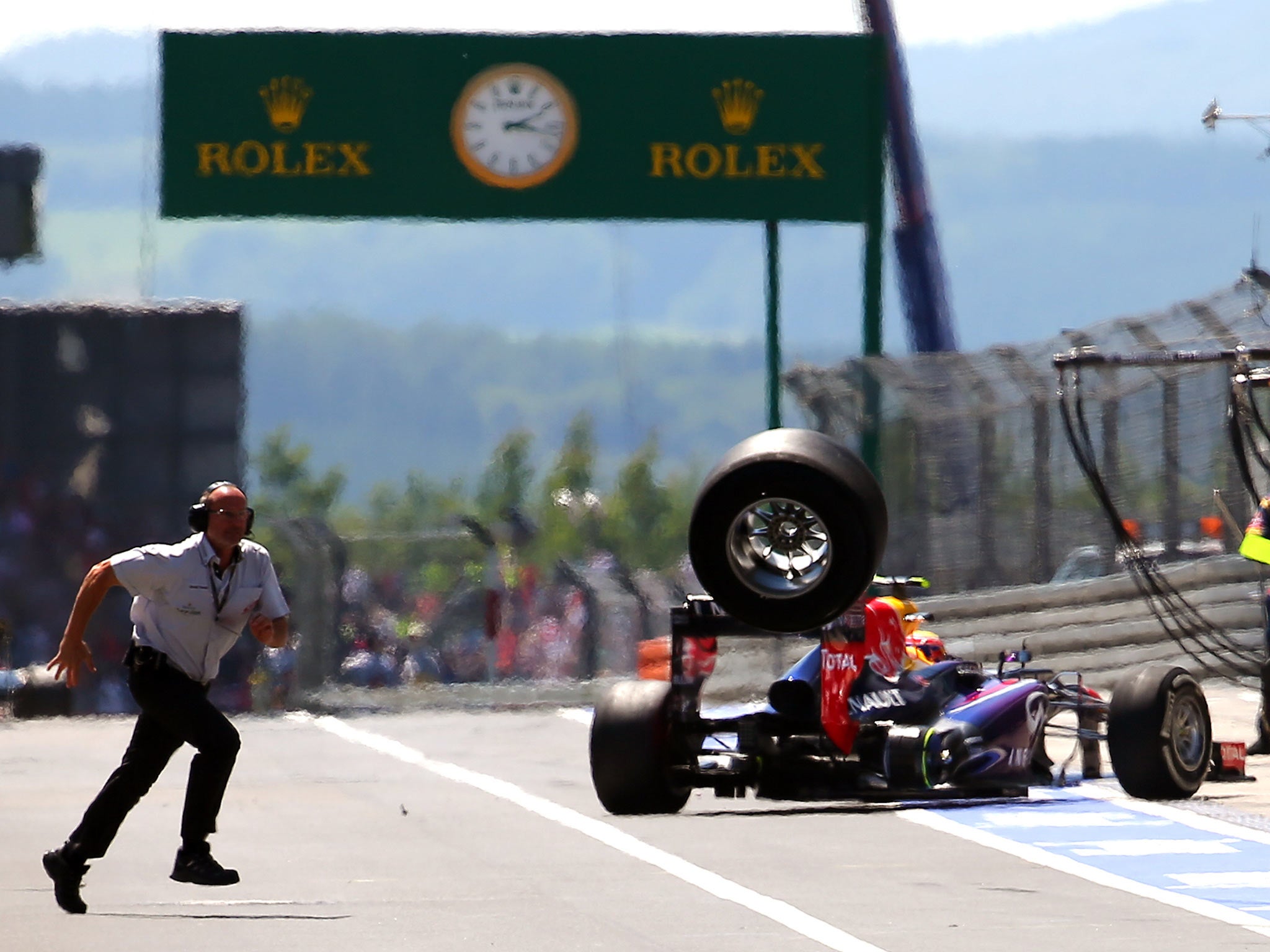 The moment Mark Webber's tyre came off