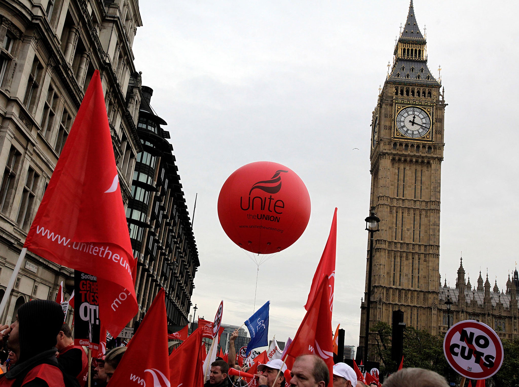 Demonstrators take part in a TUC march in protest against the government's austerity measures on October 20, 2012 in London, England. Thousands of people are taking part in the Trades Union Congress (TUC) organised anti-cuts march that ends with a rally in Hyde Park, where Labour leader Ed Miliband is scheduled to address the demonstrators