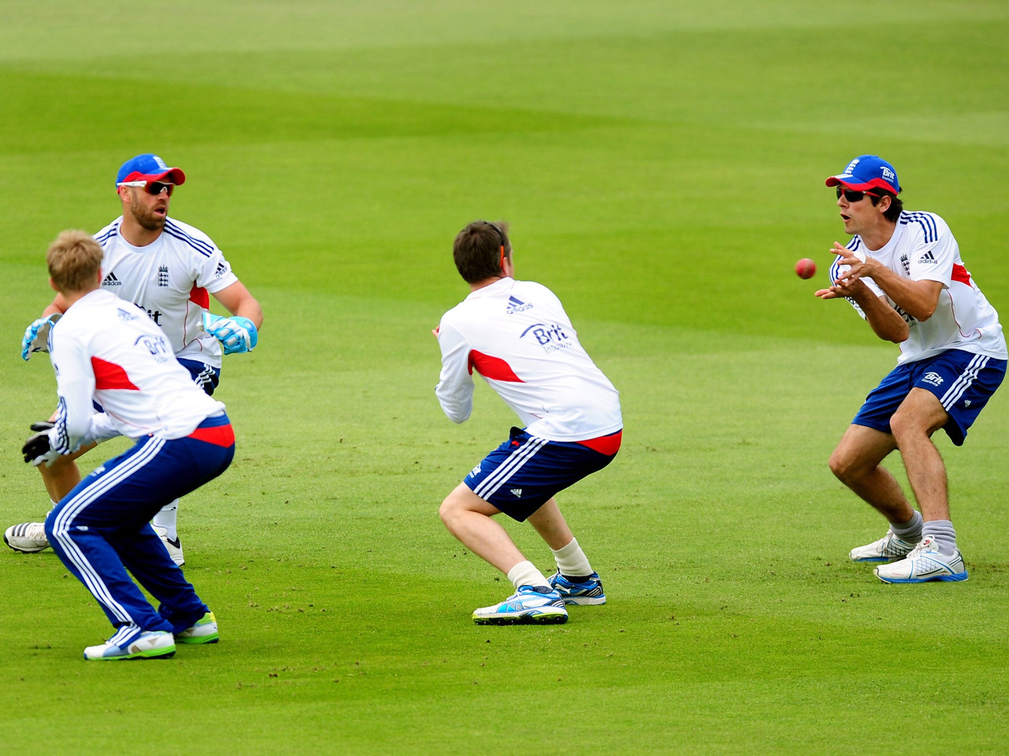 The England captain, Alastair Cook, takes a catch during practice at Trent Bridge