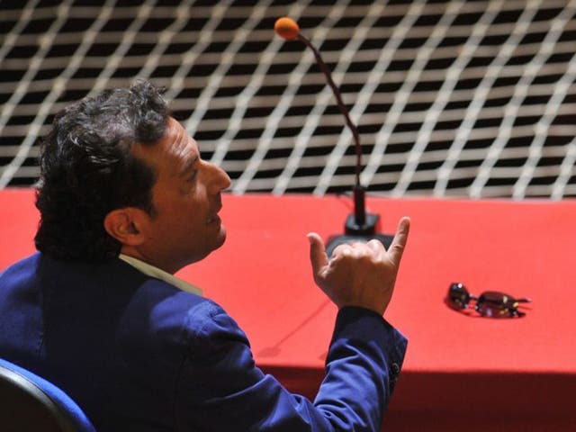 The captain of the ill-fated Costa Concordia cruise ship, Francesco Schettino seated for his trial in Grosseto, Tuscany. He is charged with multiple manslaughter over the 32 people who lost their lives and is accused of abandoning the ship while terrified
