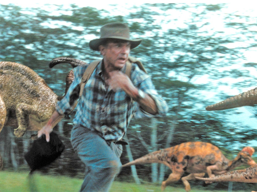 Sam Neill runs away from dinosaurs in Jurassic Park III
