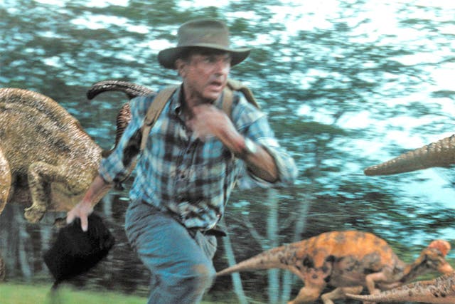 Sam Neill runs away from dinosaurs in Jurassic Park III