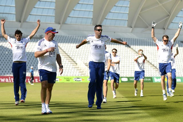 Kevin Pietersen (third left) warms up with his England teammates