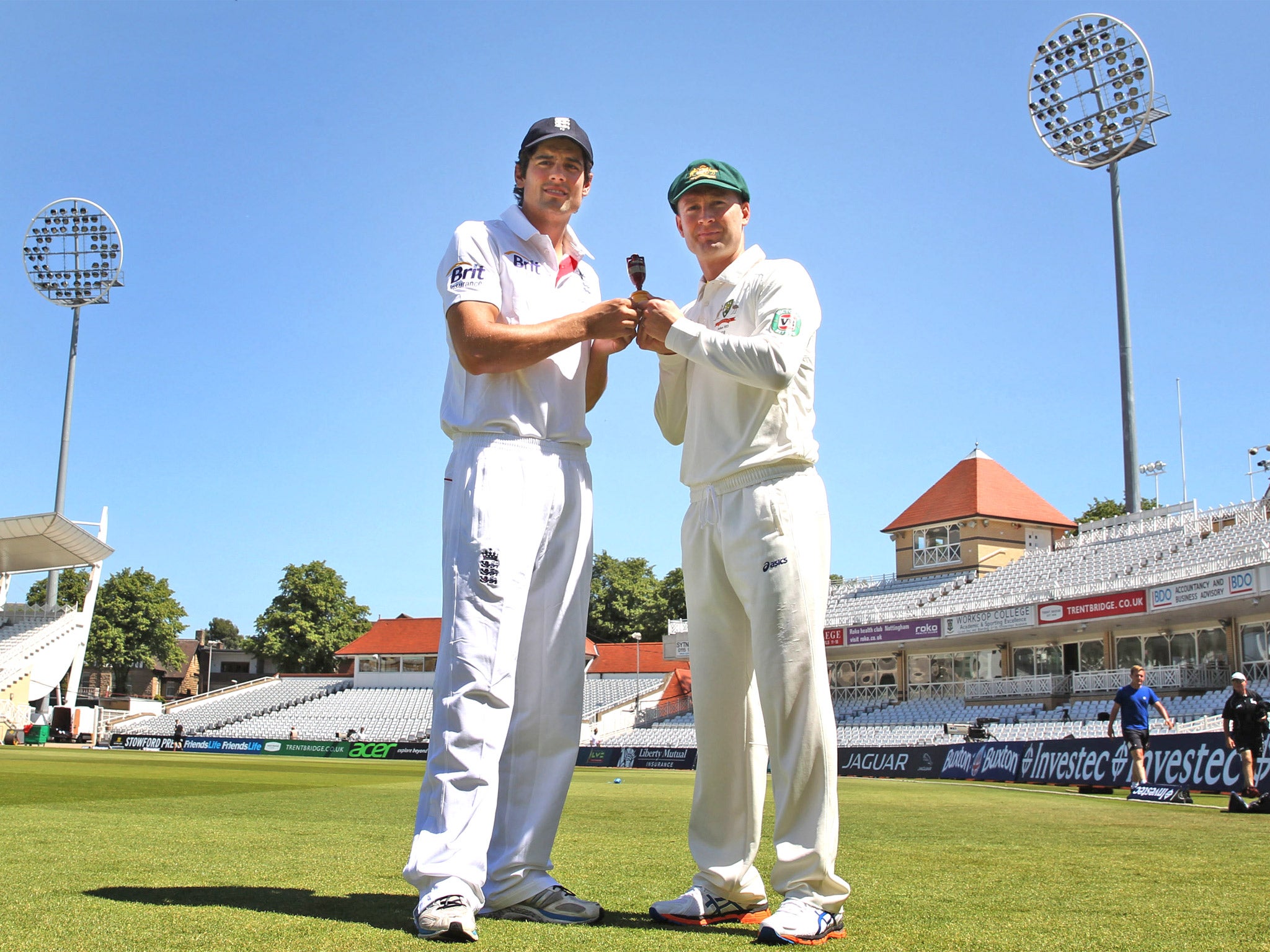 England’s Alastair Cook (left) with Australia captain Michael Clarke