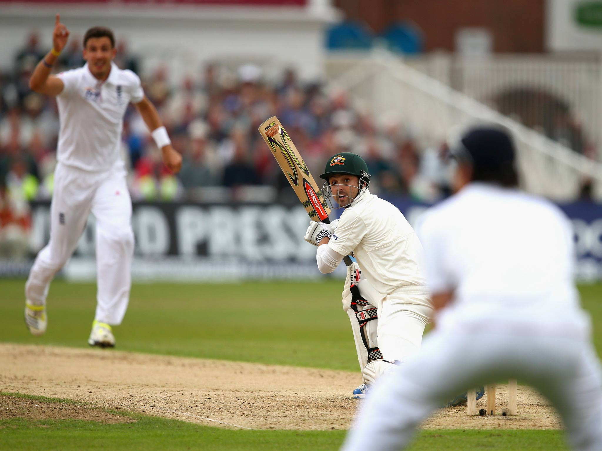 Ed Cowan of Australia is caught off the bowling of Steven Finn