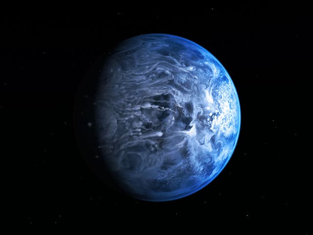 Planet HD 189733b's deep cobalt colouring comes from drops of liquid gas raining horizontally in 7,000 km/h winds