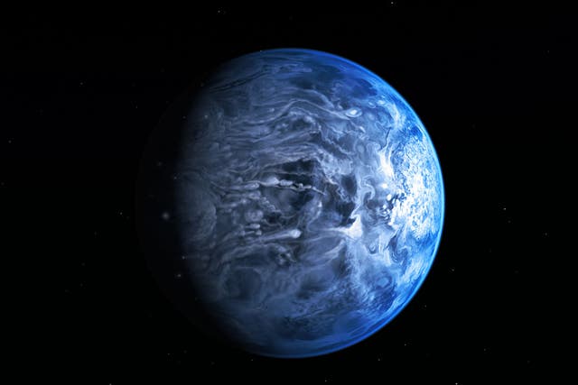 Planet HD 189733b's deep cobalt colouring comes from drops of liquid gas raining horizontally in 7,000 km/h winds