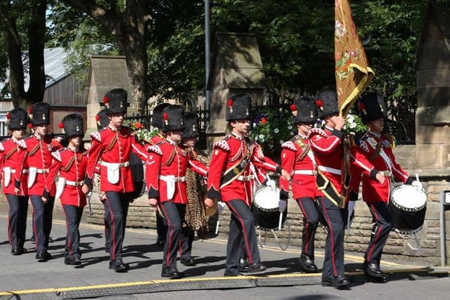 Drummers from the 2nd Battalion Royal Regiment of Fusiliers today drummed the cortege