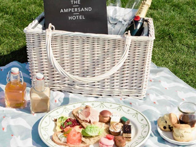 The hamper from Ampersand includes a savoury tartine, scones sentried by pots of jam and clotted cream, and a variety of sweet pastries