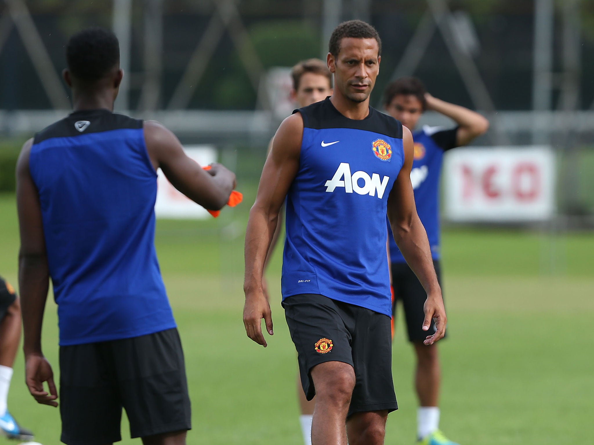 Rio Ferdinand takes part in a first team training session at Royal Bangkok Sports Club