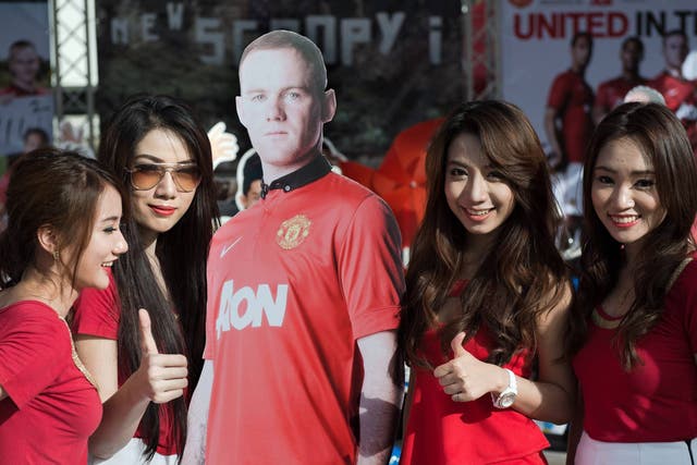 Wayne Rooney is replaced by a cardboard cut-out on United's tour
