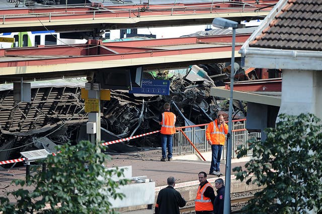 A scene from the derailment at Brétigny-sur-Orge, where a connecting bar on the track had become loose 