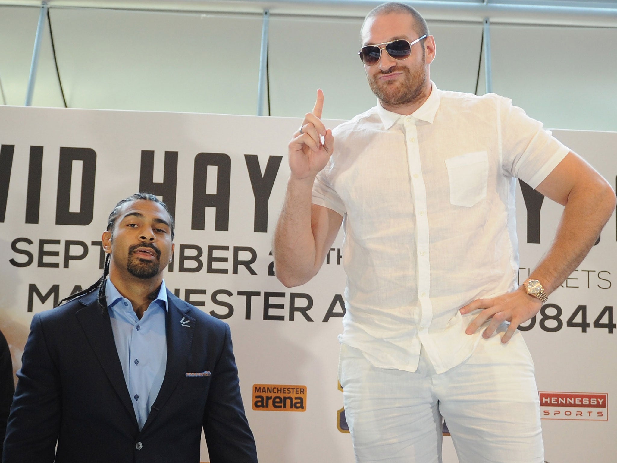 Chair devil: David Haye (left) and Tyson Fury engage in verbal sparring ahead of their meeting in September