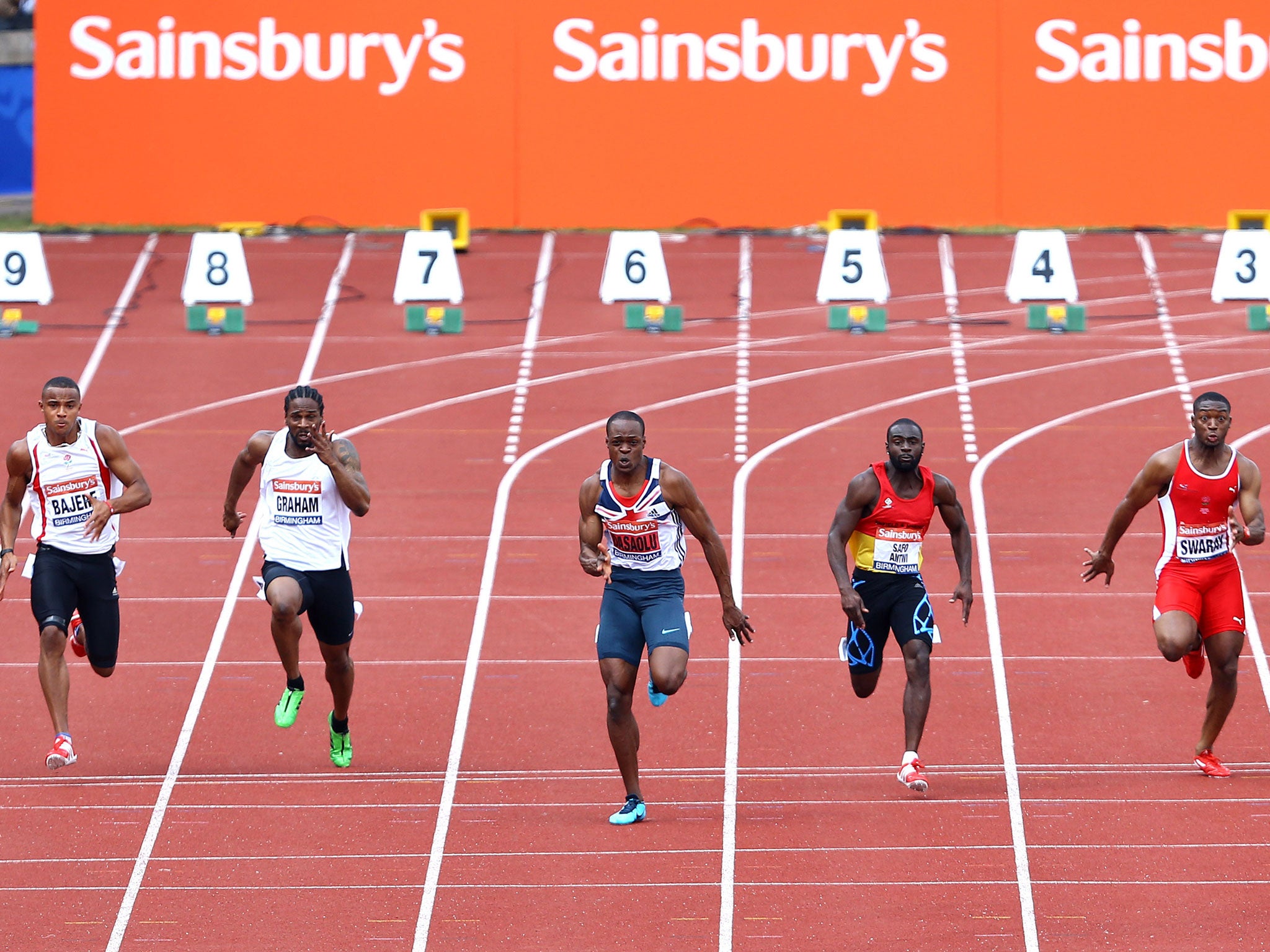 Running the show: James Dasaolu (centre) takes advantage of perfect conditions to become the second-fastest Briton of all time in Birmingham yesterday