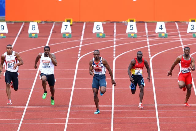 Running the show: James Dasaolu (centre) takes advantage of perfect conditions to become the second-fastest Briton of all time in Birmingham yesterday 