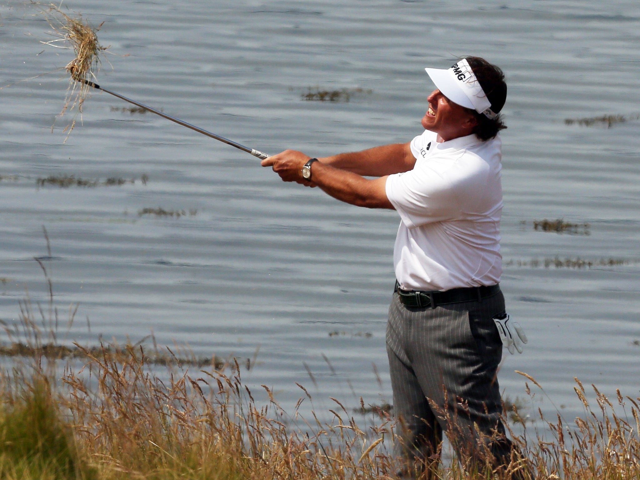 Coasting: Phil Mickelson enjoys the views on day three of the Scottish Open at Castle Stuart yesterday