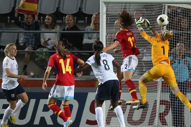 Losing face: The ball hits England keeper Karen Bardsley and goes in